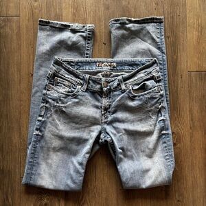 LOW RISE FLARED JEANS